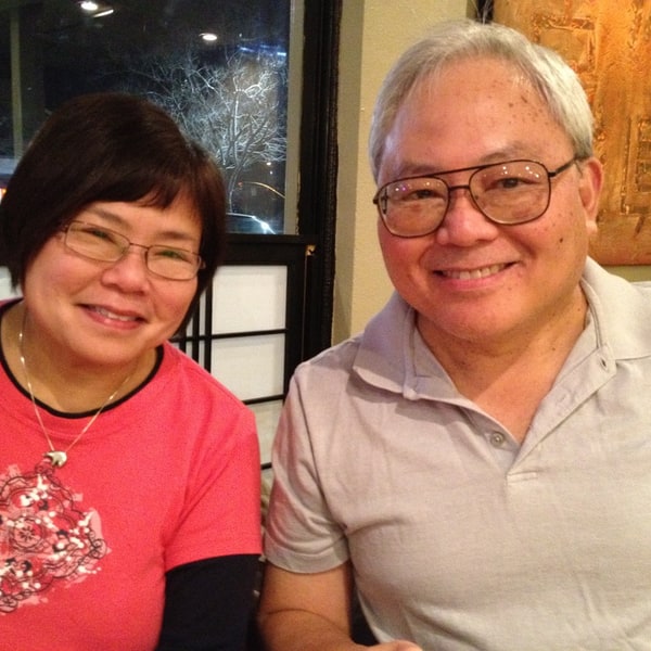 Belen smiling beside Dad